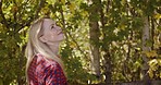 Happy, nature and smile with woman in countryside park for freedom, relax and summer break. Garden, environment and trees with girl enjoying outdoors for carefree, peace and breathing fresh air