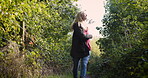 Happy woman, walking and freedom twirl in nature for travel, trip or adventure in the countryside. Blond female enjoying walk and twirling in joyful happiness for natural environment in the outdoors