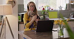 Video call, dog and remote work on a laptop with a woman at home for business or communication. Virtual meeting, headphones and pet with a happy female entrepreneur or employee working in her house