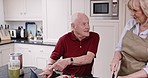 Breakfast, tablet and cooking, senior couple in kitchen with online recipe, healthy food and vegetable diet in retirement. Happy woman, old man and internet tutorial for meal prep, bonding in home.