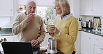 Tutorial, laptop and senior couple with a smoothie and watching online video and making healthy drink for wellness. Happy, love and old people taste health shake together enjoying retirement