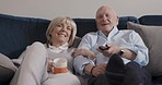 Conversation, tv and happy old couple relax, bonding or enjoy watching television, home broadcast or subscription video. Quality time, remote control and senior people streaming romantic movie