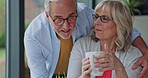 Senior couple, retirement and a hug during morning coffee at home. Love and care of happy elderly man and woman in their house during a morning of calm, peace and relax