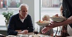 Restaurant lunch, grandparents and child eating together, hungry and waitress with food. Happy, family and senior man and woman with a boy kid at a cafe for breakfast or dinner and server hospitality