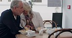 Lunch, restaurant and senior couple eating together for bonding, quality time and conversation. Retirement, marriage and mature man and woman talking with food to relax, chat and date in coffee shop