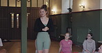 Yoga, coaching and health with teacher in studio for meditation, fitness and workout. Wellness, spiritual and exercise with group of people in class for pilates, mindfulness and holistic healing