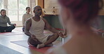Yoga, meditation and fitness with teacher in studio for coaching, health and workout. Wellness, spiritual and exercise with group of people in class for pilates, mindfulness and holistic healing