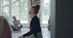 Yoga, coaching and fitness with teacher in studio for meditation, health and workout. Wellness, spiritual and exercise with group of people in class for pilates, mindfulness and holistic healing
