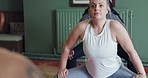 Stretching, woman and pilates with balance, workout and fitness warm up in a yoga studio or gym class. Wellness, mindfulness and female athlete with health and spiritual exercise with peace and relax
