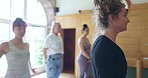 Yoga, instructor and teaching class for exercise, workout and holistic wellness from pilates training or mindfulness. Fitness, coaching and personal trainer with healthy advice for person in gym 