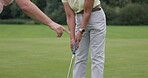 Golf course, teaching woman and swing club at field, nature or outdoor help in lesson. Golfing ball, instructor and hands of person learning, training and putter, healthy exercise and sport on grass