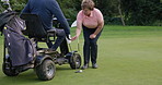 Wheelchair, golf instructor and man on wheelchair for playing game, training and sports. Retirement, golfer club and elderly person with disability learning golfing for fun, hobby and stroke outdoors
