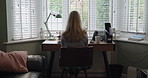 Woman, desk and home office for work or dog on floor for love labrador, pet happy for remote job. Female person, coffee and online writing research or freelance company, copywriting or animal care