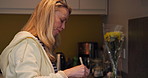 Home, cooking and woman in a kitchen, tasting and hobby with lunch, activity and food. Person, house and lady with a spoon, pot and healthy meal with diet, ingredients and wellness with dinner