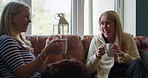 Coffee cup, laughing friends and women conversation, talking and speaking in morning chat, communication or discussion. Pet dog, share funny news and home people consulting, gossip or drink green tea