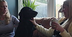 Dog, friends happy and home women rub, playing and relax wellness care, support and love for animals loyalty. Coffee break cup, living room couch or friendly owner bonding together with apartment pet