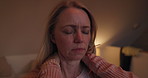 Night, stress or pressure and a woman in the bedroom of her home feeling exhausted with insomnia. Face, mental health or frustration and a tired or sleepless person sitting on a bed in an apartment