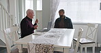 Man, real estate agent and laptop for home meeting, planning and talking of rent, mortgage or payment plan. Senior seller, realtor or agent with clients or people on computer for house and investment
