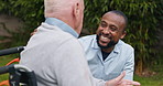 Support, conversation and old man in wheelchair with nurse at park, garden or outdoor together. Elderly person with a disability, talk to caregiver and rehabilitation, medical healthcare and smile