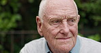 Senior, man and thinking outdoor for memory, remember or mental health in garden of retirement home. Elderly, person or thoughtful with wonder, reflection or nostalgia in backyard of hospice or house