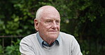 Elderly, man and thinking outdoor for memory, remember or mental health in garden of retirement home. Senior, person or thoughtful with wonder, reflection or nostalgia in backyard of hospice or house