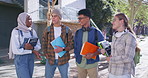 Discussion, group and students at campus for university education, learning or study. Talking, bridge and happy friends with conversation outdoor for college, scholarship or tertiary entry exam.