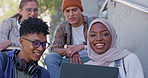 Happy students, diversity and project with laptop on stairs for online learning, education or development at campus. Young people, friends or group on computer for teamwork on project or assignment