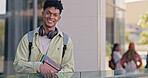 Face, student and happy on campus for education, learning and academic knowledge in university outdoor. Boy, portrait and books in college for reading, studying and communications course for future