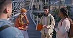 University, friends and people on campus talking, in conversation and chatting outdoors. Academy students, modern college and happy men and women at school for education, learning and study group
