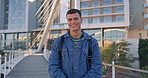 University student, man and happy with face in city, backpack or ready for education, bridge and progress. Person, campus and smile for scholarship, studying and development at college in Mexico