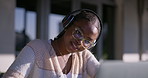 Black girl, notes and university student with headphones outdoor for learning, music and education. Writing, audio tech and female person study for college, scholarship or admission test in Kenya.