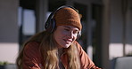 Girl, reading and university student with headphones outdoor for learning, music and education. Happy, audio tech and female person studying for college, scholarship or admission test in London.