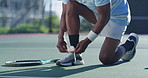 Hands, tie shoelace and man on tennis court, fitness and training with wellness, sneakers and workout. Person, closeup and player at facility, hobby and recreation with activity, exercise and health