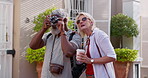 Mature couple, pointing and camera for photography with bonding or fun, break and summer holiday. People, multiracial relationship and happy or smile as tourist on road vacation, love and memories