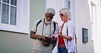 Mature couple, outdoor and map for directions to navigate city as tourist on holiday, break and relax. Multiracial relationship and people with pointing for traveling, tour and vacation on location