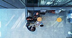Documents, luggage and travel with corporate people in lobby of office for discussion or meeting. Collaboration, conversation and suitcase with business employee team it workplace together from above