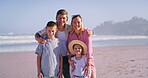Family, face and beach hug on vacation, love and trust on trip to tropical island for bonding. Parents, kids and outdoor for embrace in relationship, portrait and travel on ocean holiday for peace