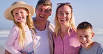 Happy family, face and laughing by sea, hug and trust on trip to tropical island for bonding. Parents, kids and outdoor for embrace in relationship, portrait and travel on ocean holiday for peace