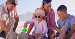 Family, beach and building a sandcastle on holiday, love and laughing together for humor in nature. Parents, children and playing games with sand on vacation, outdoor and funny conversation with toys