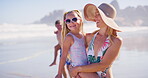 Walking, fun and family in vacation, beach and children with parent, happy and travel for bonding. Outdoor, people and kids in holiday, carrying and mom with youth, relax and adventure in weekend