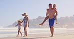 Water, journey and family in vacation, outdoor and children with parents, happy and travel for bonding. Beach, people and kids in holiday, mom and dad with youth, relax and adventure in weekend