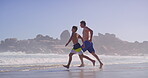 Playing, dad and son in beach, bonding and holiday for fun, travel and adventure in nature and water. Outdoor, tropical and fresh air for child with father, ocean and happy in paradise, kid and trip