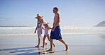 Walking, parents and girl with holding hands on beach, family vacation and bonding by seaside. Blue sky, mother and father with kid for holiday adventure, connection or child jump with trust on ocean