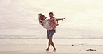 Carry, laughing and walking with couple on beach together for honeymoon holiday, travel or vacation. Anniversary, funny or romance with happy man and woman outdoor in nature for adventure or bonding
