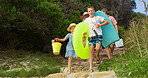 Holding hands, running and steps with family at beach together for holiday, travel or vacation. Energy, excitement or smile with mother, father and children outdoor on stairs for bonding in summer
