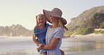 Beach, carry or funny with mother and daughter on sand outdoor for holiday, travel or vacation together. Love, laughing or morning with single parent woman and girl child by ocean or sea for bonding