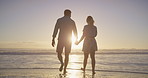 Beach, freedom and couple holding hands for romance, honeymoon and travel with fun and summer love. Woman, man and sea for date with sunset back, adventure or happy bonding and joy on Miami holiday