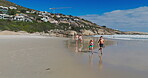 Family, parents and children running on beach outdoor for summer vacation, tropical journey and bonding together. Excited, kids and energy on ocean with holiday fun, morning walk and travel adventure