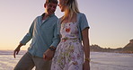 Beach, walking and couple on date, holding hands and bonding in nature, adventure and romance on holiday. Love, man and relax with woman, travel and peace of ocean, together and getaway for lovers