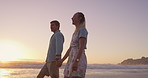 Beach, waves and couple on holiday, holding hands and bonding in nature, talking and romance on date. Love, man and happy with woman, travel and peace of ocean, break and getaway for lovers and relax